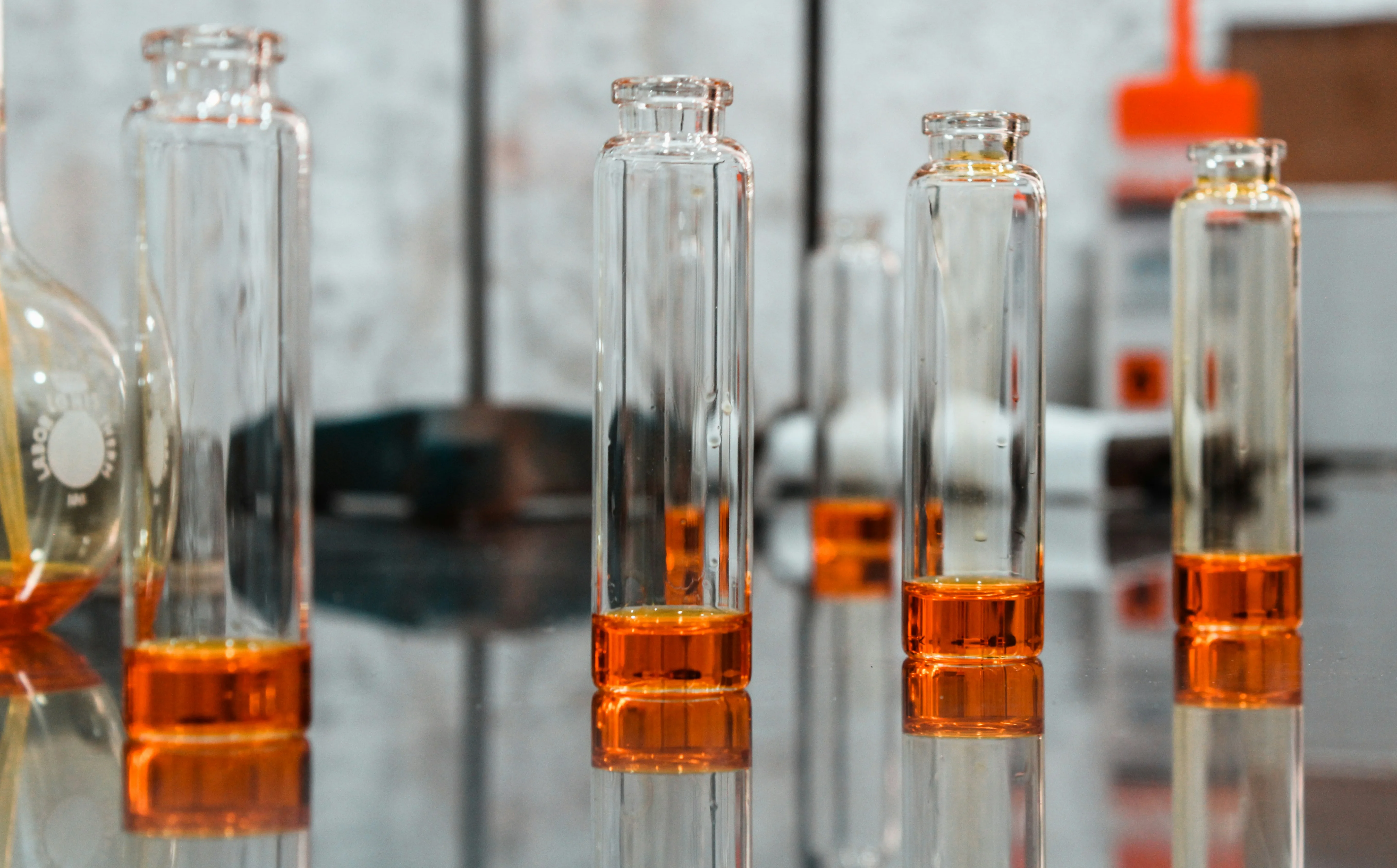 Refined laboratory analytical glassware with clear aroma chemical samples
